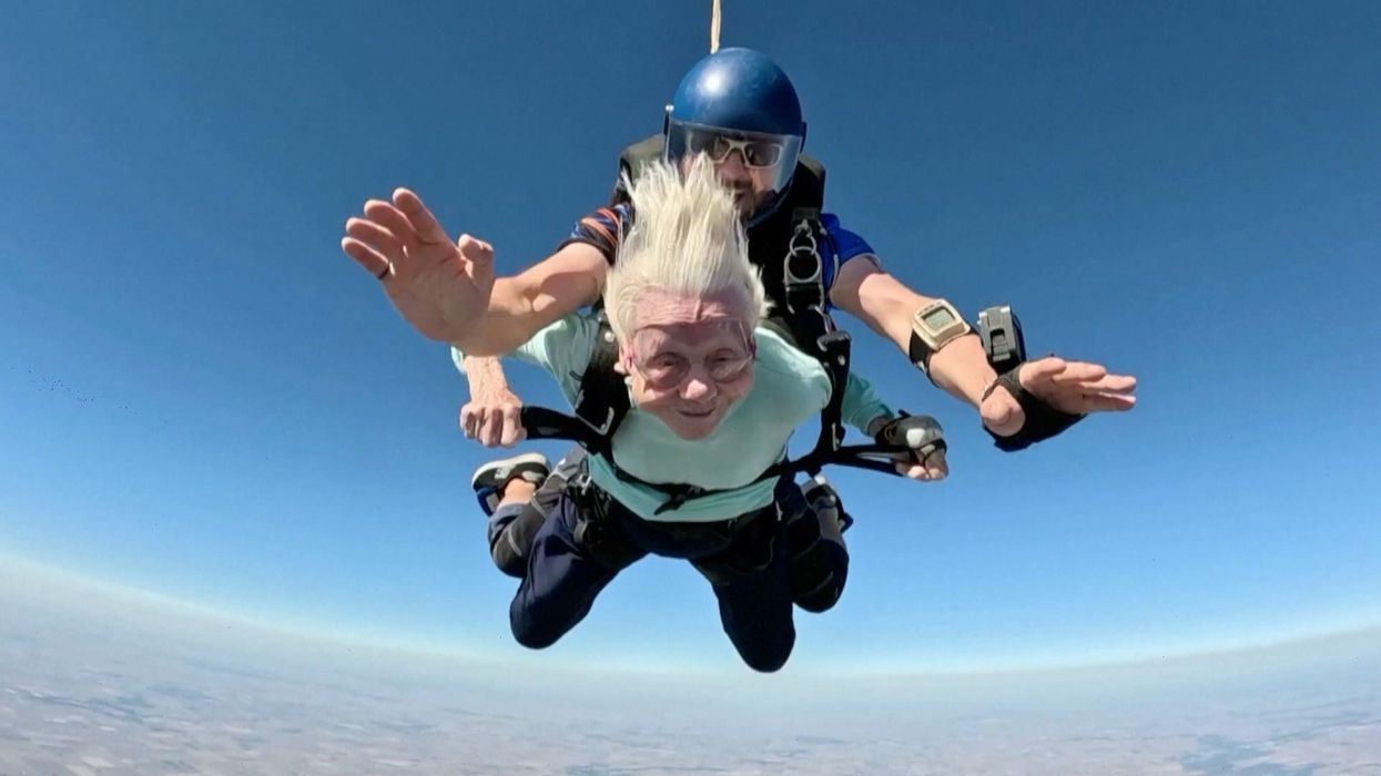 Woman survives 15,000ft skydive after parachute fails to open