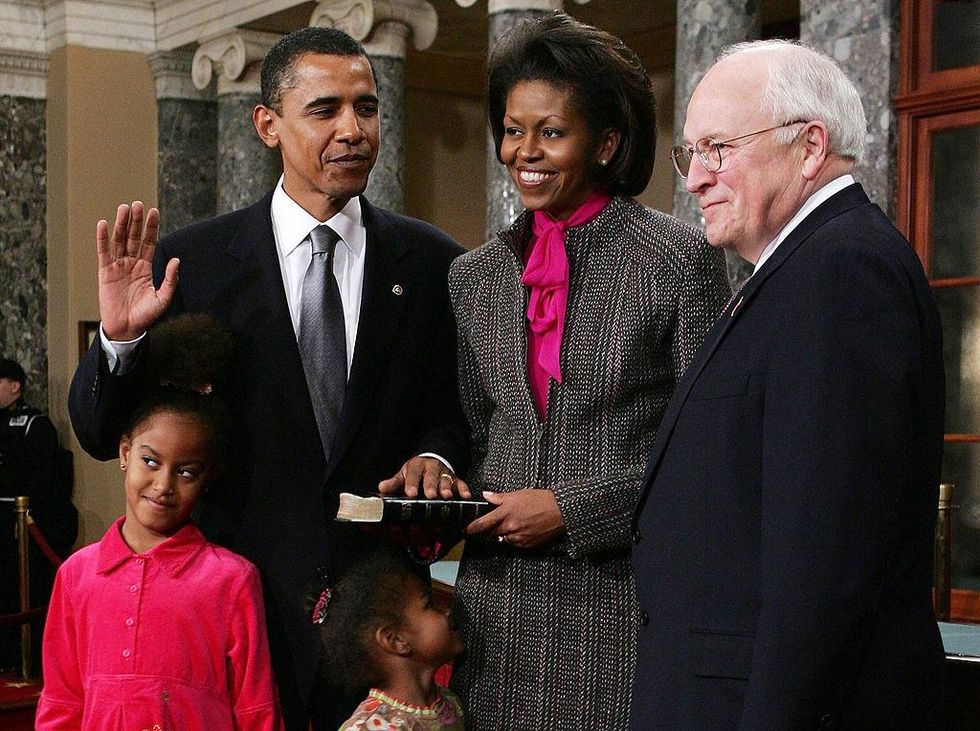 4 January 2005:  U.S. Senator Barack Obama (D-IL) (2nd L) poses for with his wife Michelle (2nd R), Vice President Dick Cheney (R), daughters (C) Malia and Sasha during the reenactment of a swearing -in ceremony on Capitol Hill in Washington, DC. The entire 109th Congress was sworn in 4 January.