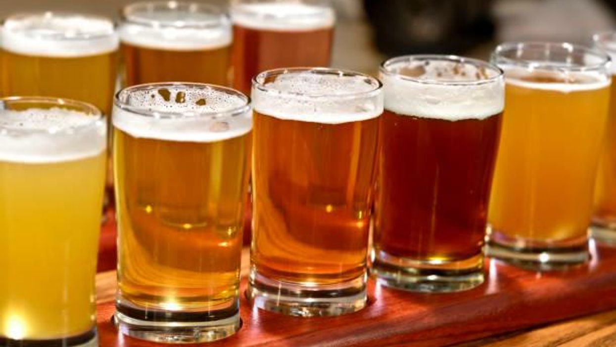 Man with chest hair bikini top shotgunning a White Claw becomes instant internet icon