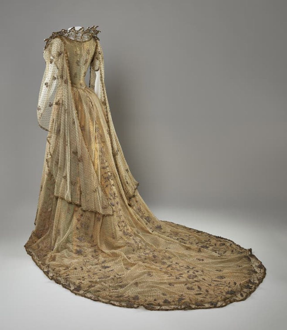 A back view of Queen Alexandra\u2019s gold coronation dress