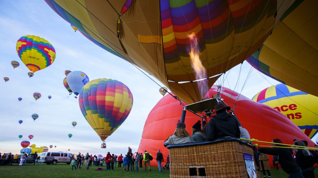 A balloon launches at the Albuquerque Balloon Fiesta (Nadav Soroker/The Albuquerque Journal via AP)