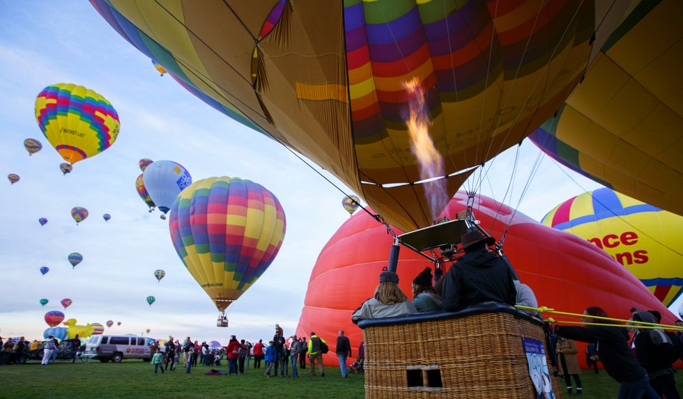 A balloon launches at the Albuquerque Balloon Fiesta (Nadav Soroker/The Albuquerque Journal via AP)