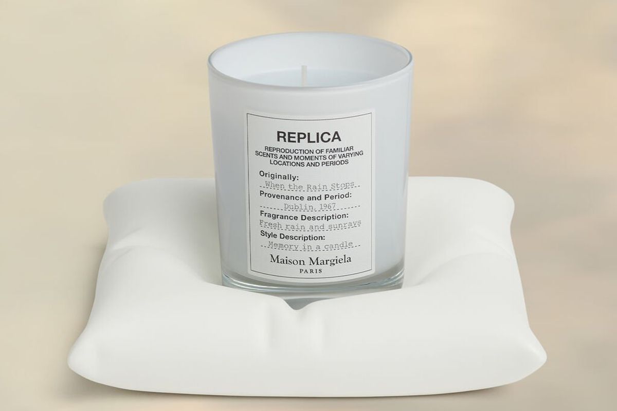 A candle sat on a concrete pillow