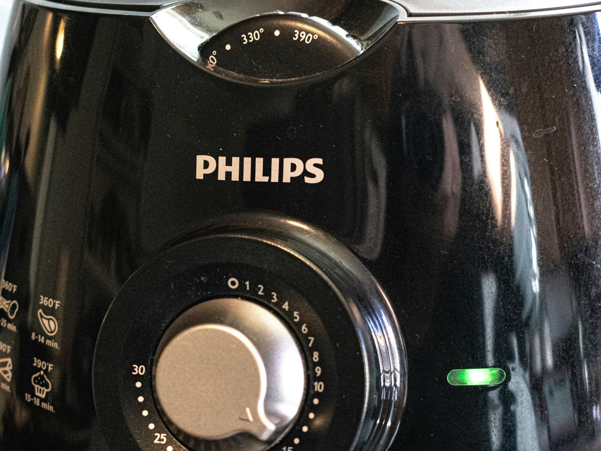 A close up of a black blender on a table