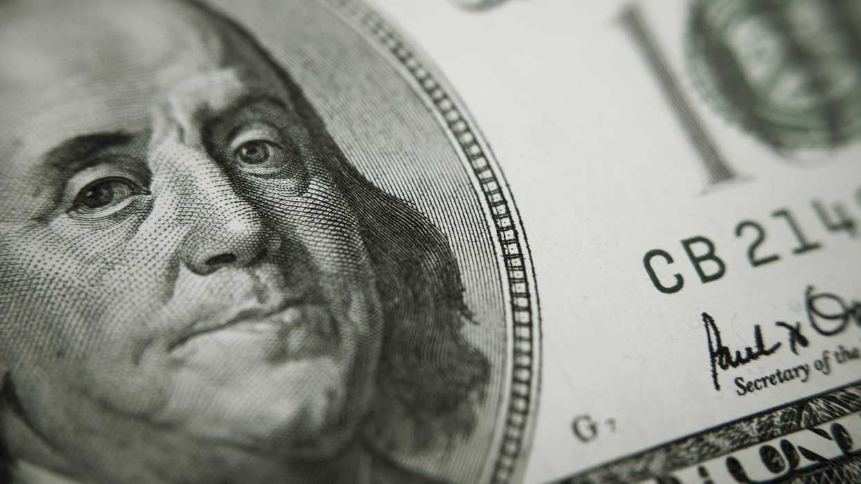 A closeup of a Benjamin Franklin $100 bill.