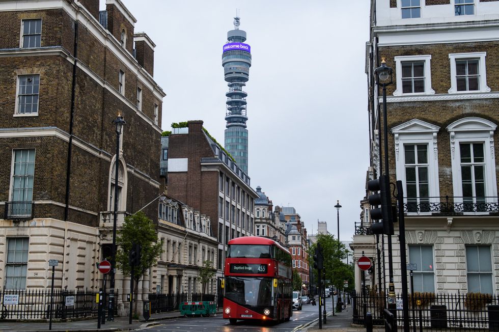 A digital message, which reads \u201cLess URL, more IRL. Welcome back.\u201d is displayed on the BT Tower Infoband, 190 metres above the streets of London as BT marks the latest phase of the Government\u2019s Covid-19 lockdown measures easing (Anthony Upton/PA)