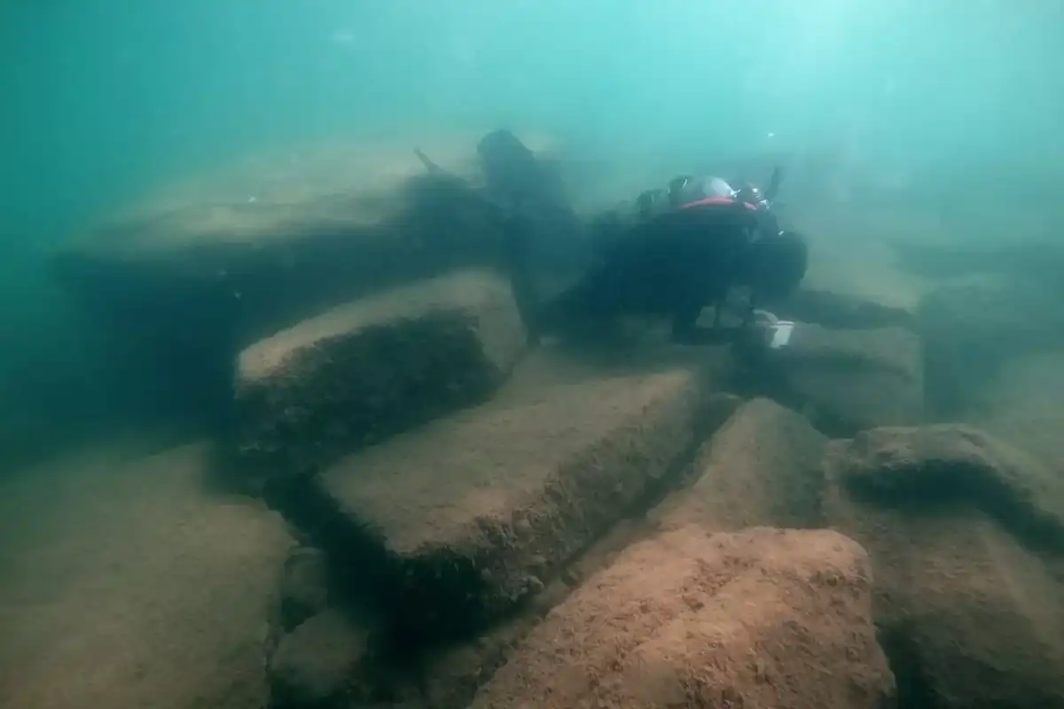 A diver inspects ancient stone structures discovered in Italy's Grado lagoon
