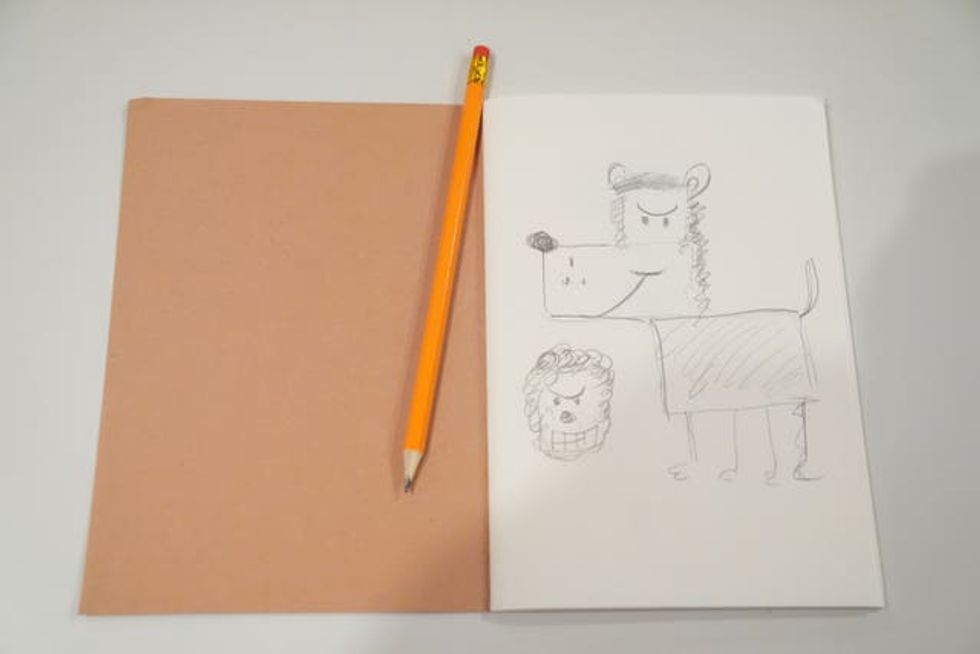 A drawing of Gnasher and Dennis by Queen Camilla during a visit to National Library of Scotland