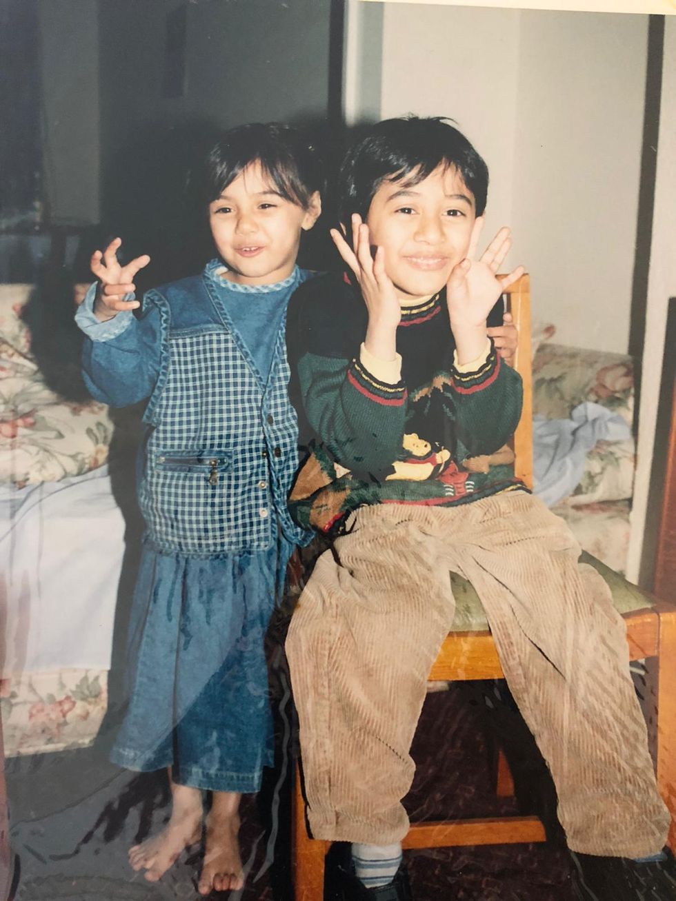 A family photo of Unzela Khan Sheikh with her brother