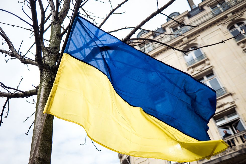A flag of Ukraine at a rally in support of Ukraine in Paris, France, on 12 March 2025