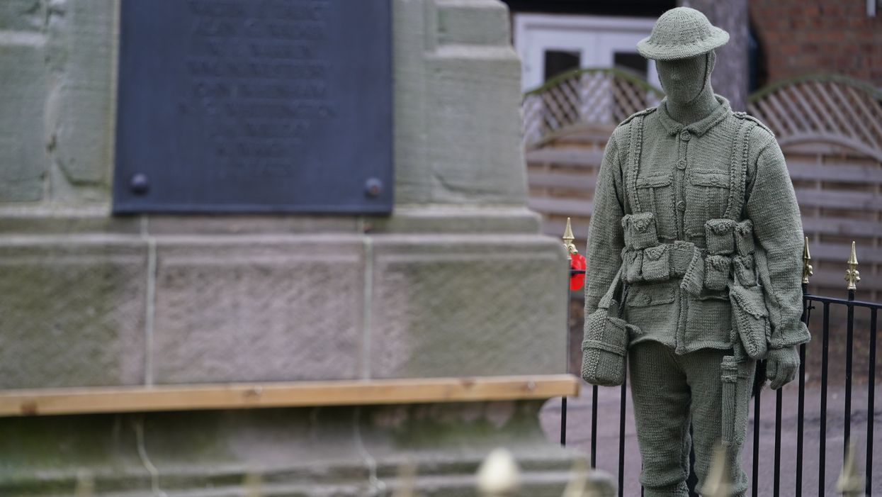 A life-sized knitted soldier (Mike Egerton/PA)