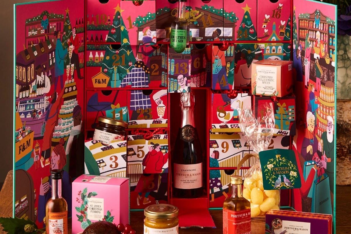 A look inside Fortnum and Mason's 2024 feasting advent calendar, including a half-bottle of champagne