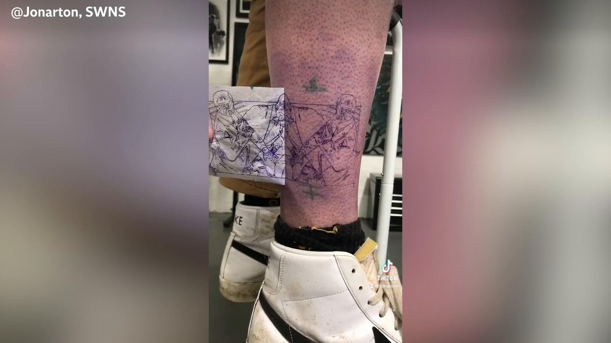 Someone has gotten a tattoo of Will Smith slapping Chris Rock