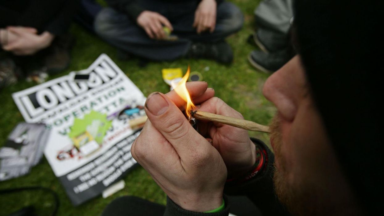 A man smoking at the '420 Celebration'  in Hyde Park