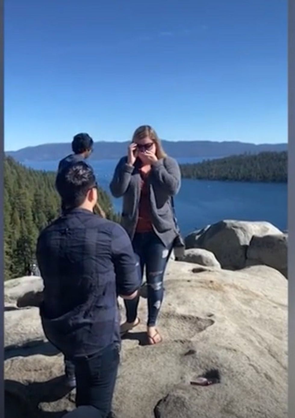 <p>A man walked right into shot during the proposal</p>