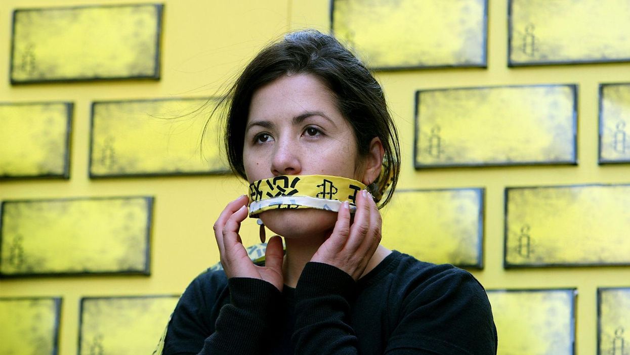 A member of Amnesty International protesting against censorship in 2008