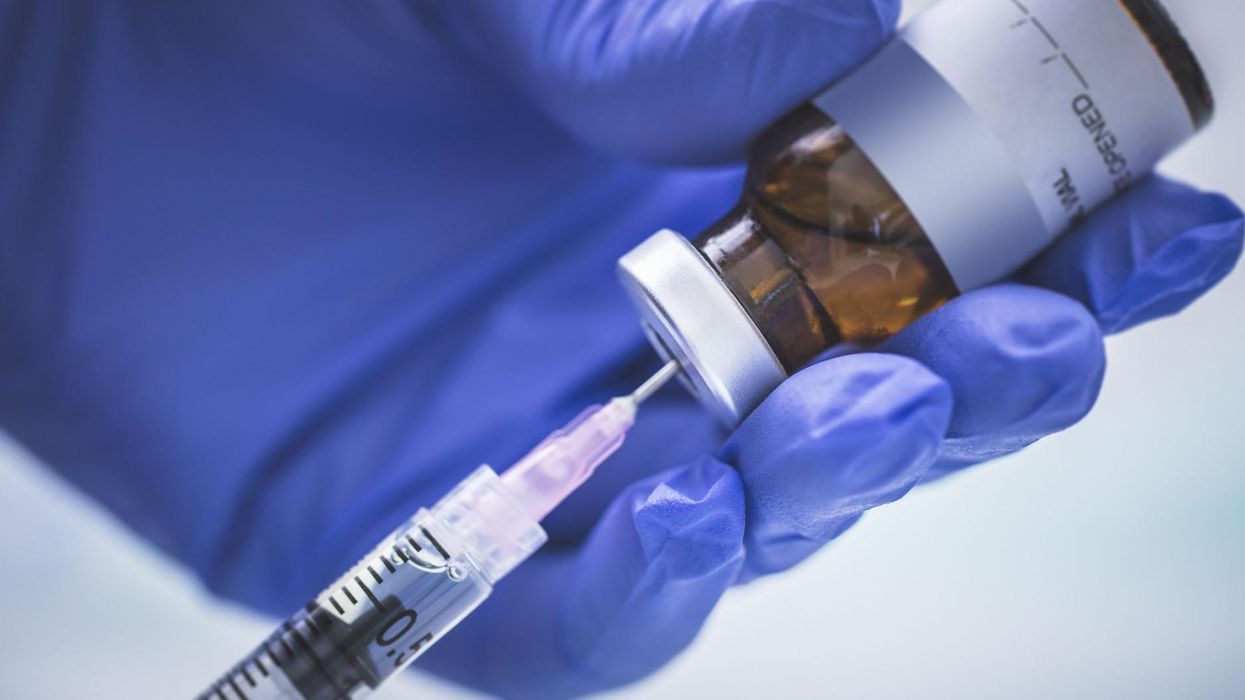 A nurse preparing a vaccination