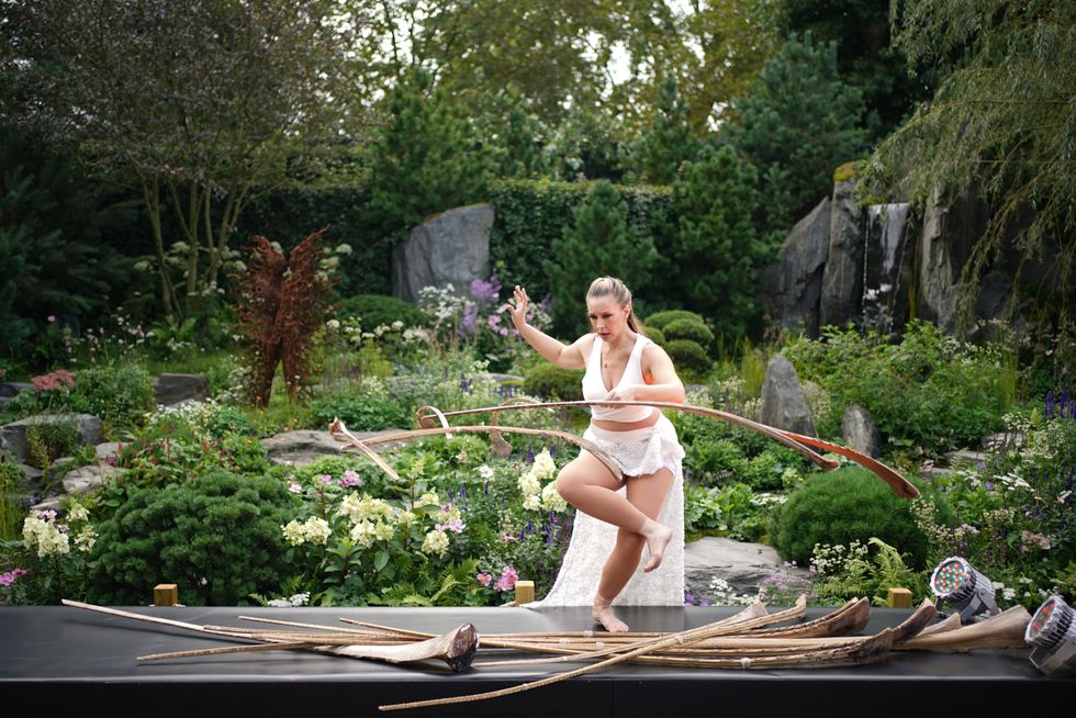 A performer in the A Garden Between Continents display (Yui Mok/PA)