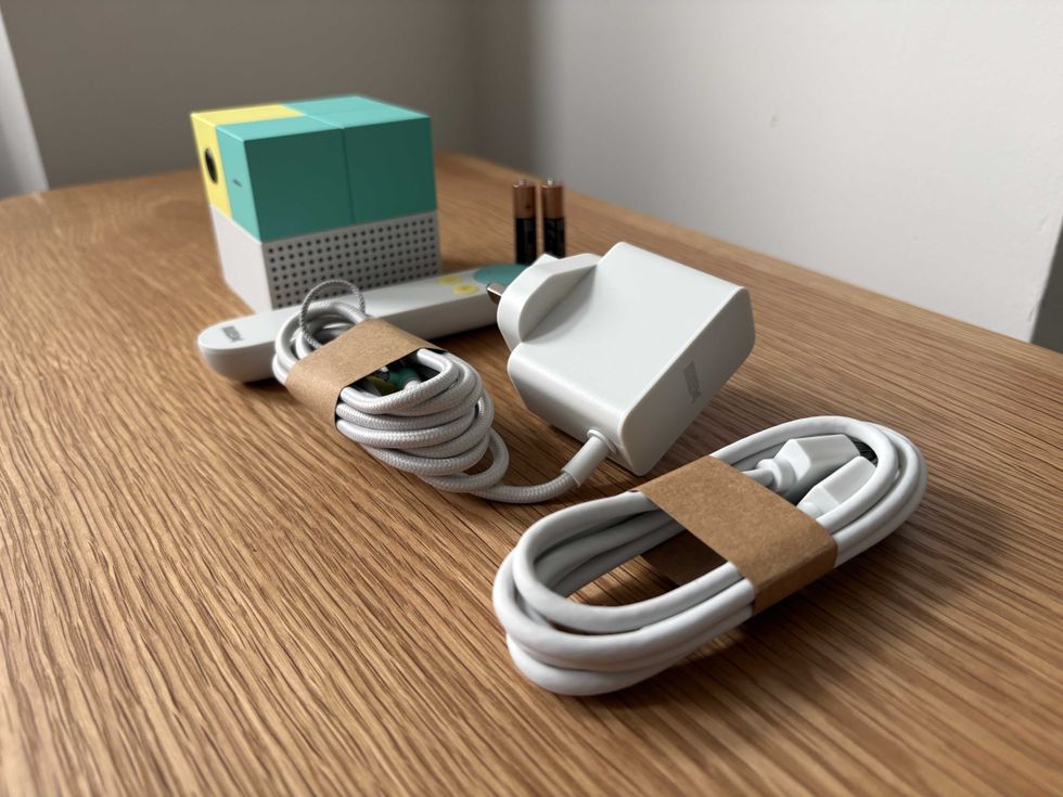 A photo of the Nex Playground console, controller with batteries, power cable and HDMI lead