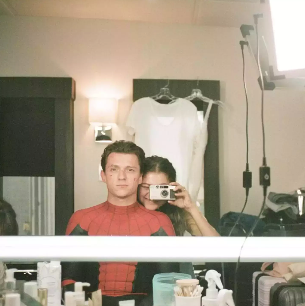 A picture of Tom Holland and Zendaya reading the Spider-Man 4 script together