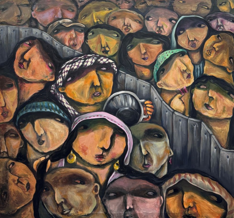 A piece of artwork of a series of faces