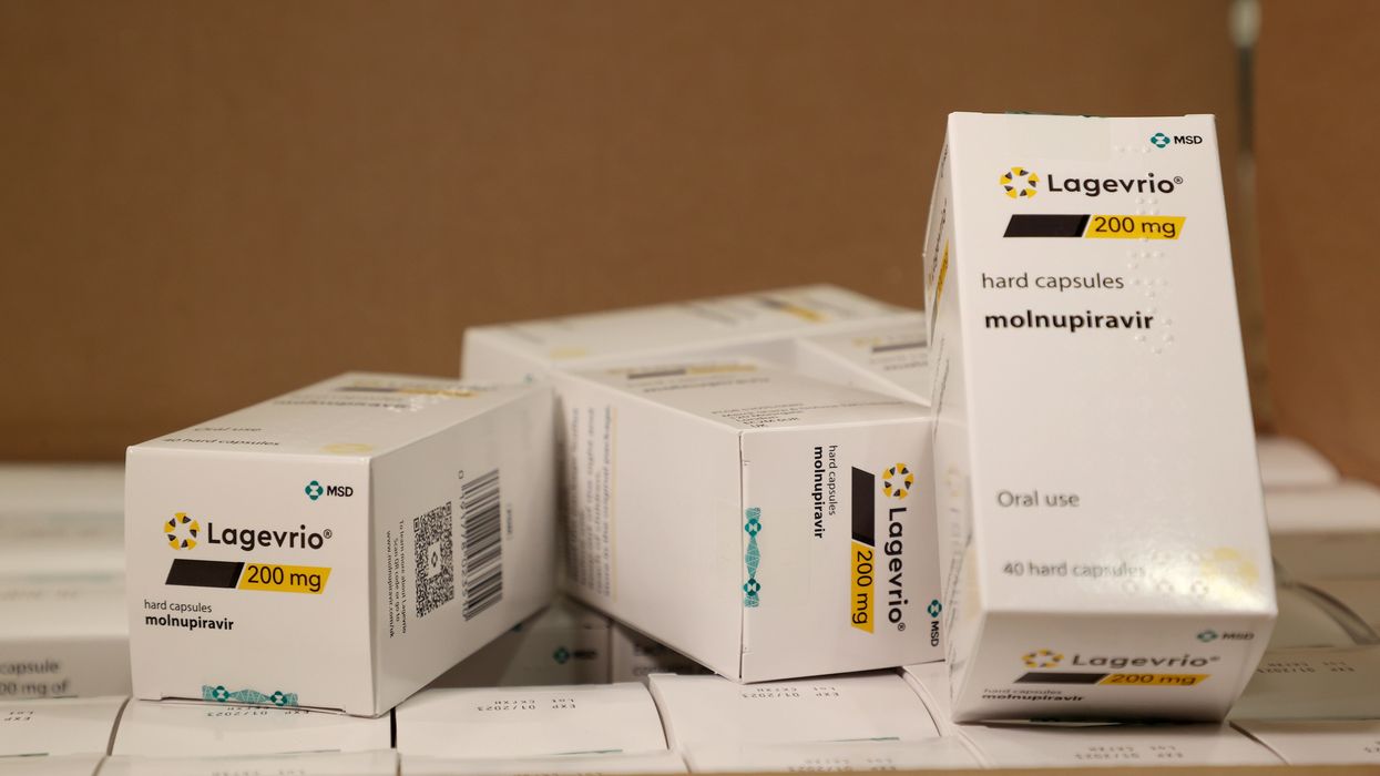 A pile of white boxes of the drug molnupiravir, an antiviral treatment for Covid-19