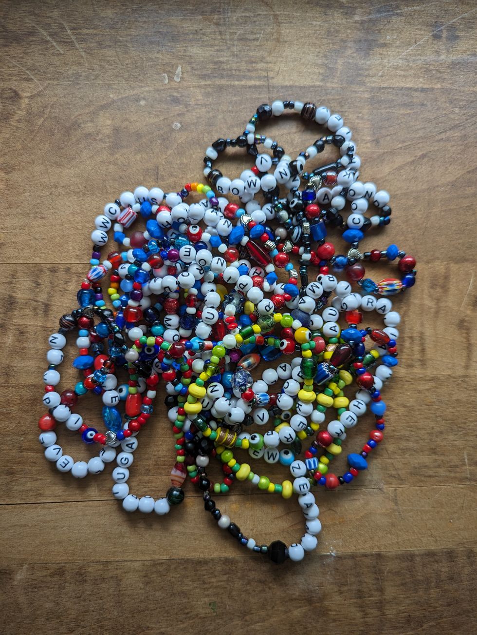 A pile of Women's World Cup-themed bracelets
