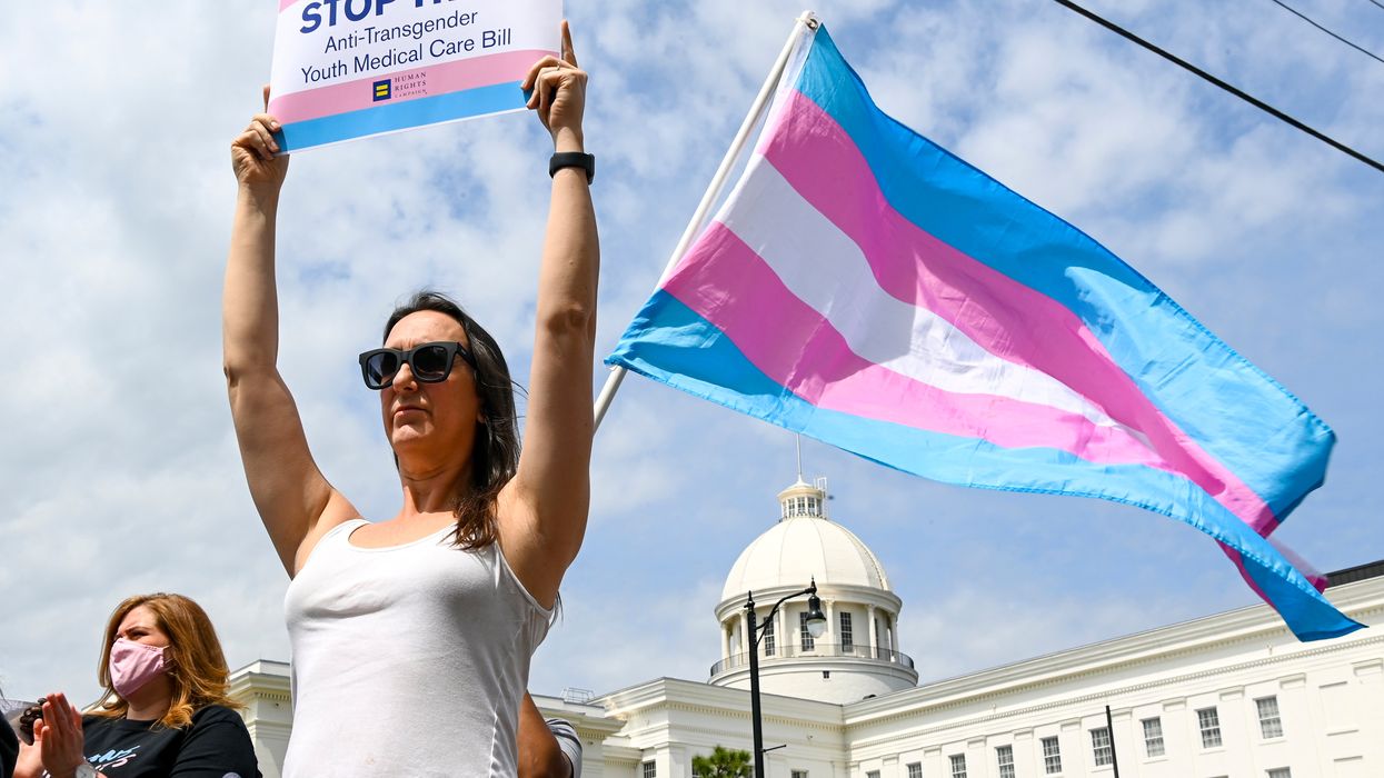 <p>A rally at the Alabama State House in protest at new anti-trans legislation</p>