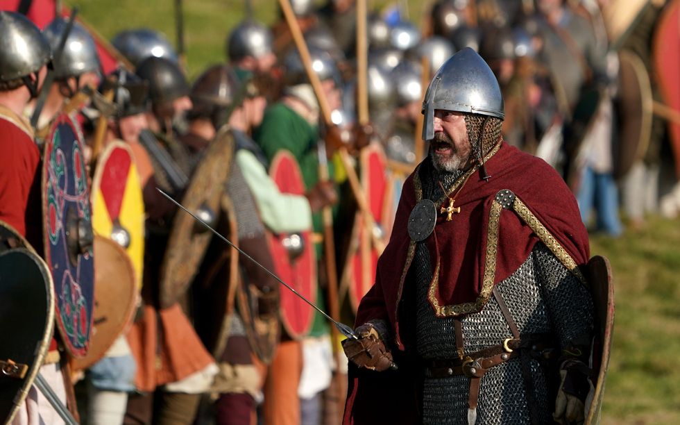 A re-enactor playing the part of King Harold Godwinson (Gareth Fuller/PA)
