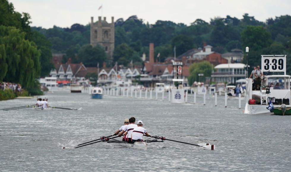 A rowing crew make their way up towards the start of the race. (Andrew Matthews/PA)