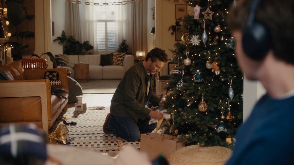 A scene from the 2025 John Lewis Christmas ad showing a father and son