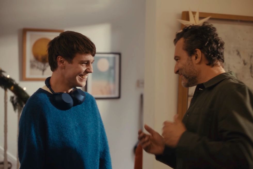 A scene from the John Lewis 2025 Christmas ad showing father and son smiling