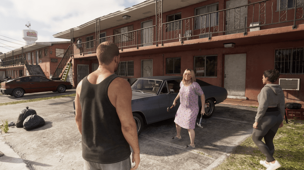 A screenshot of Jason and Lucia speaking to 'hammer lady' in GTA 6: An Extended Look
