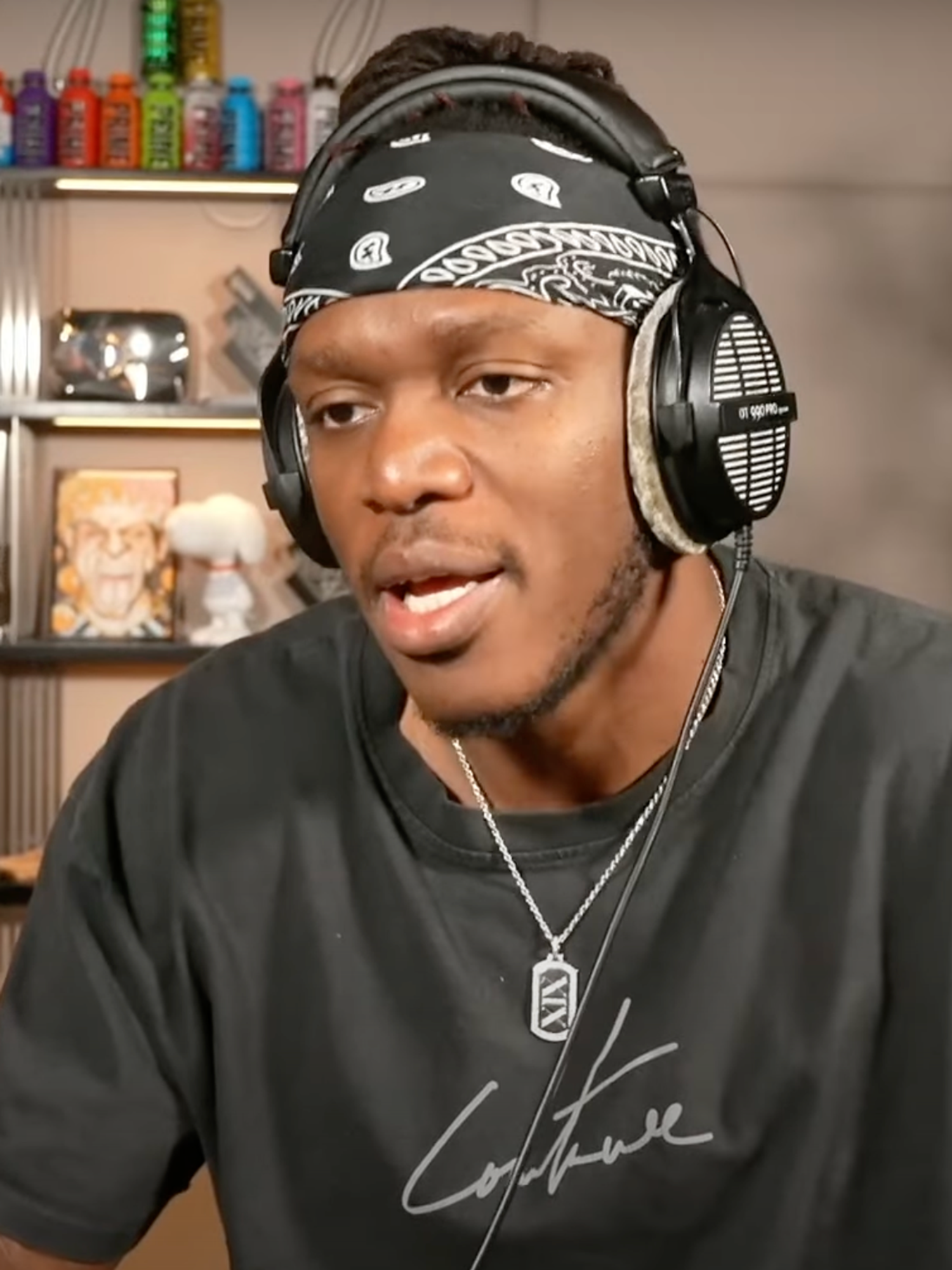 A screenshot of KSI in his video called 'THE HATE ON MY MUSIC IS FORCED'