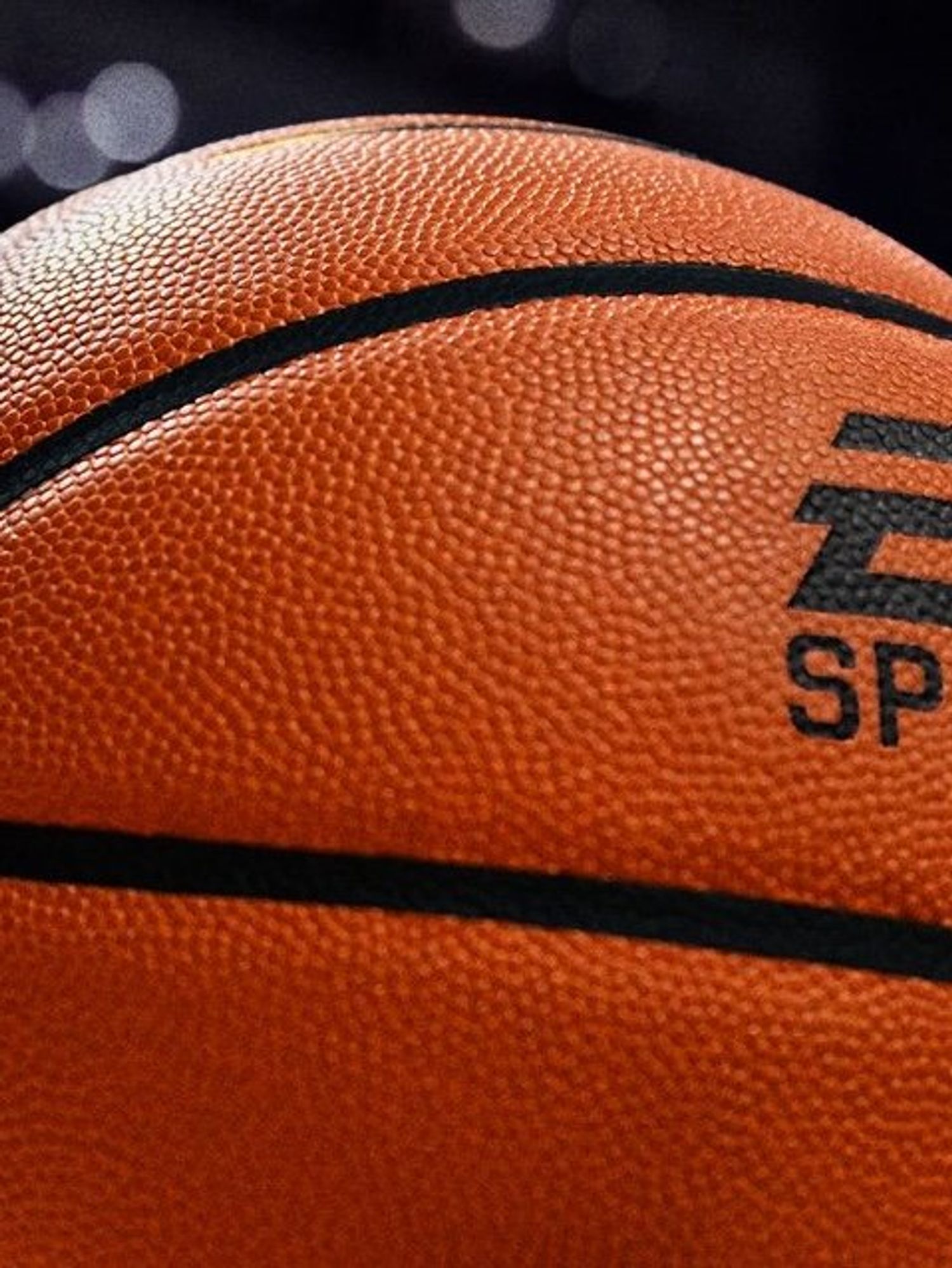 A screenshot of the EA Sports logo on a basketball