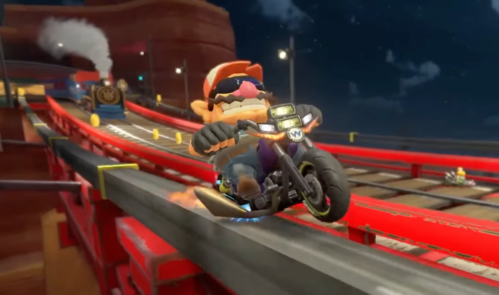 A screenshot of Wario in a trailer for the Mario Kart World Nintendo Switch 2 bundle