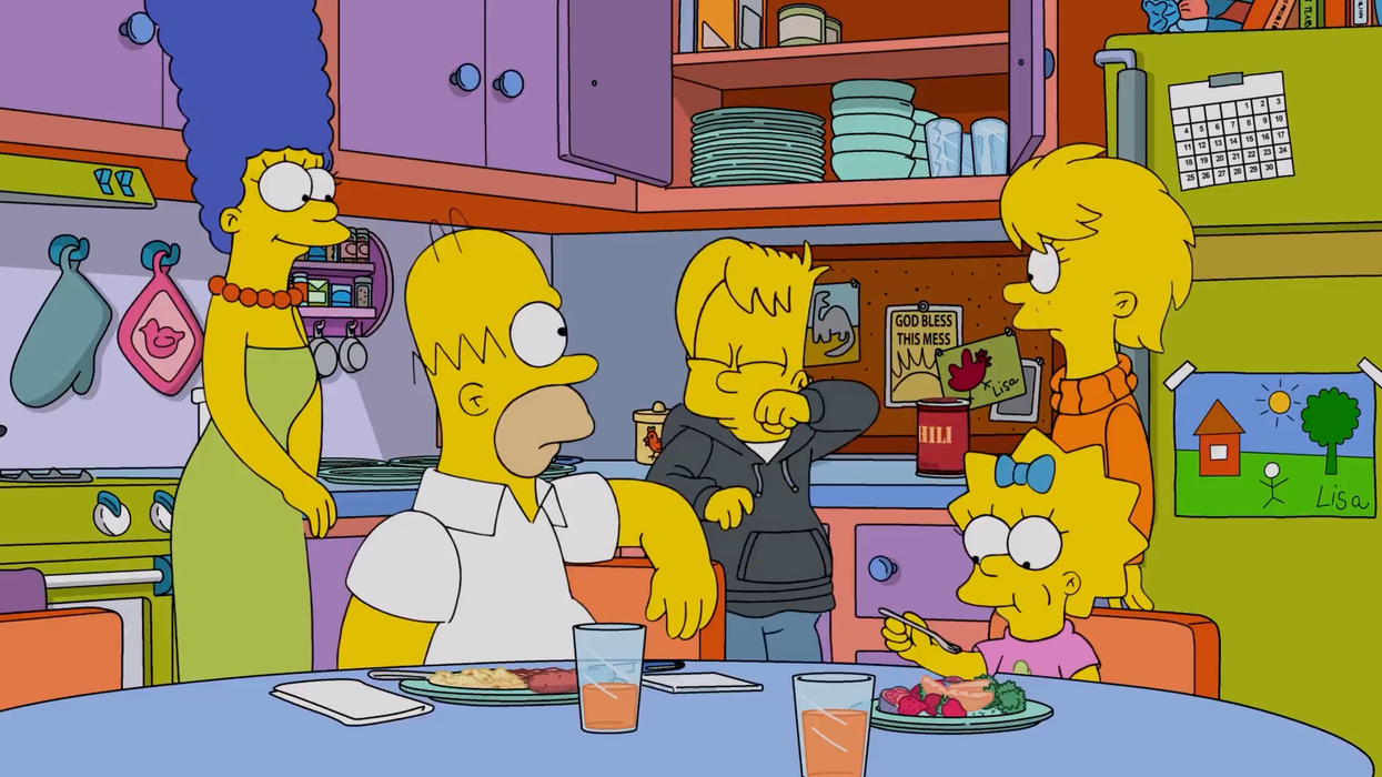 A still from an episode of The Simpsons, showing all five characters in the kitchen.