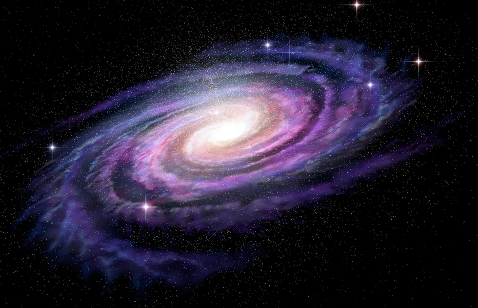 A stock image of a spiral galaxy deep in space
