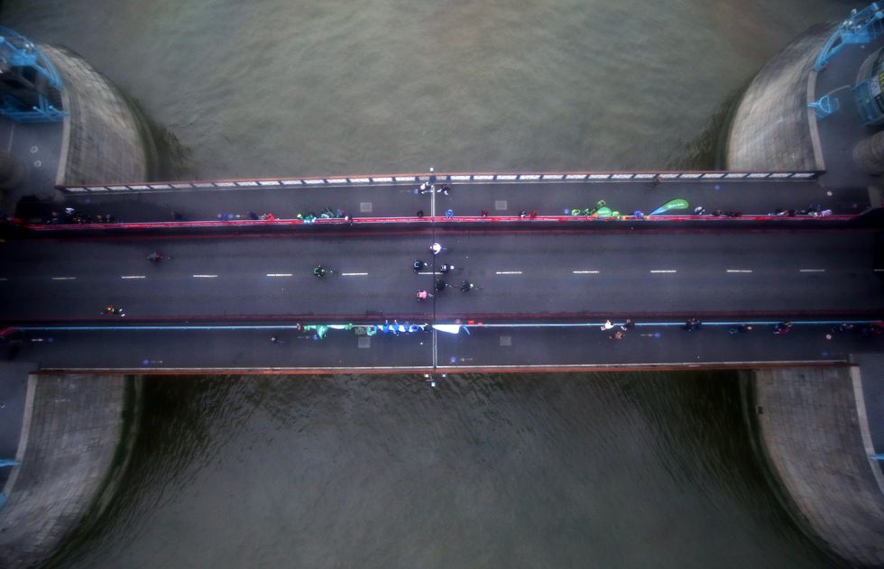 A view from above as the men\u2019s wheelchair race passes over Tower Bridge (Steven Paston/PA)