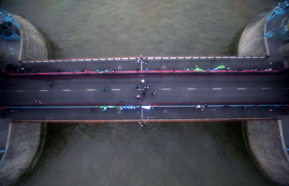A view from above as the men\u2019s wheelchair race passes over Tower Bridge (Steven Paston/PA)