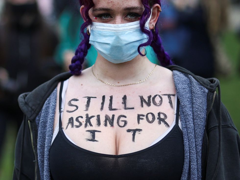 <p>A woman stresses that harassment and abuse can never be justified</p>