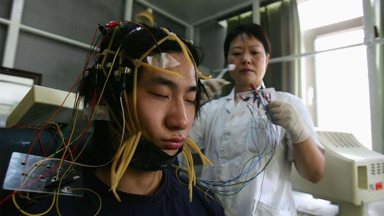 A young Chinese internet addict receives an electroencephalogram check in Beijing, China.