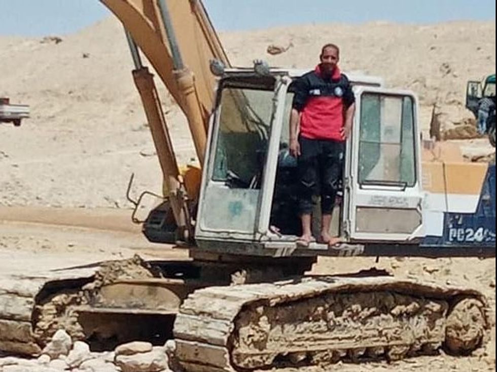 Abdul-Gawad and his digger