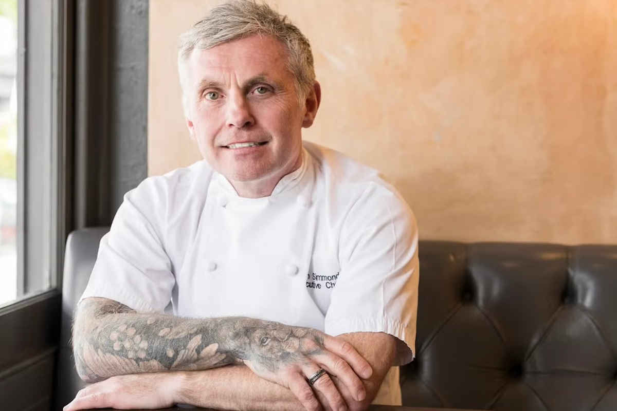 Adam Simmonds, executive chef at Home Kitchen poses in the restaurant