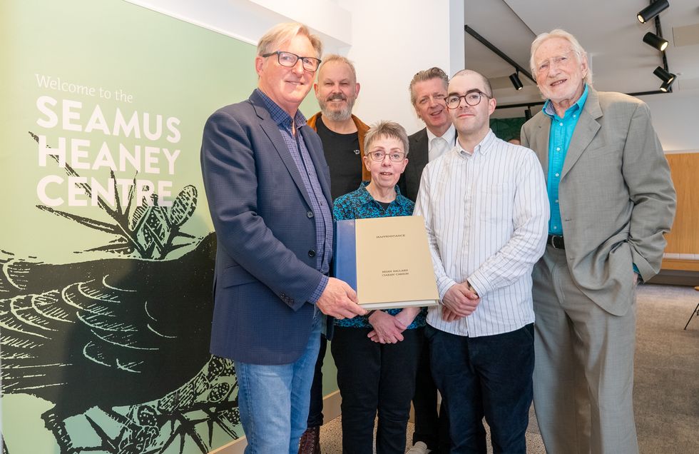 Adrian Dunbar gives rare art book to the Seamus Heaney Centre