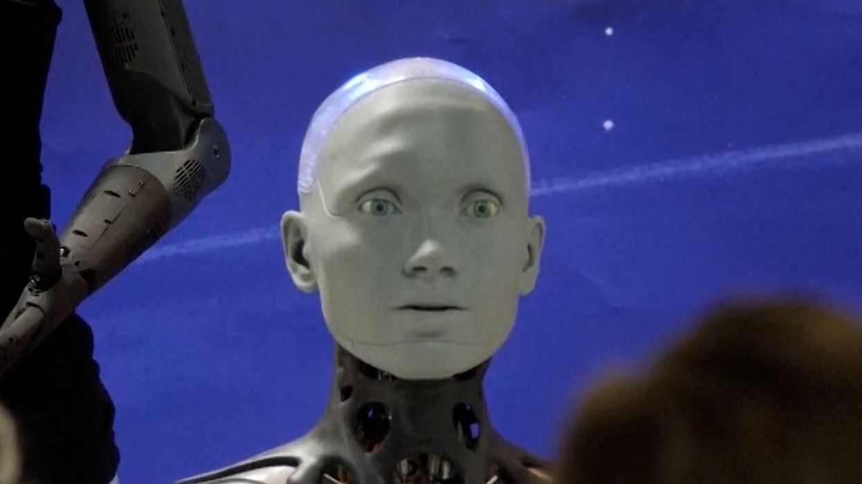 https://www.indy100.com/media-library/ai-robot-asked-if-it-would-rebel-against-humans-at-world-s-first.jpg?id=34311579&width=1245&height=700&quality=85&coordinates=0%2C0%2C0%2C0