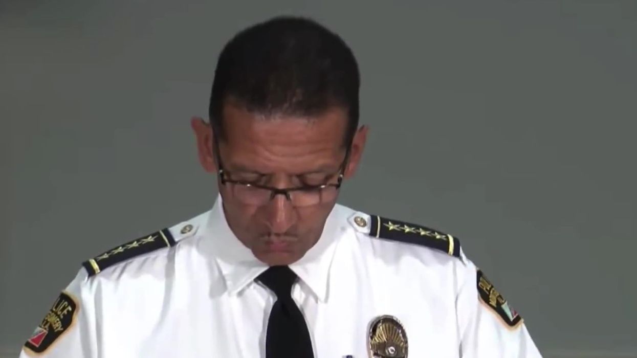 Reggie Ray, the man with the folding chair from Alabama brawl, pictured after handing himself in