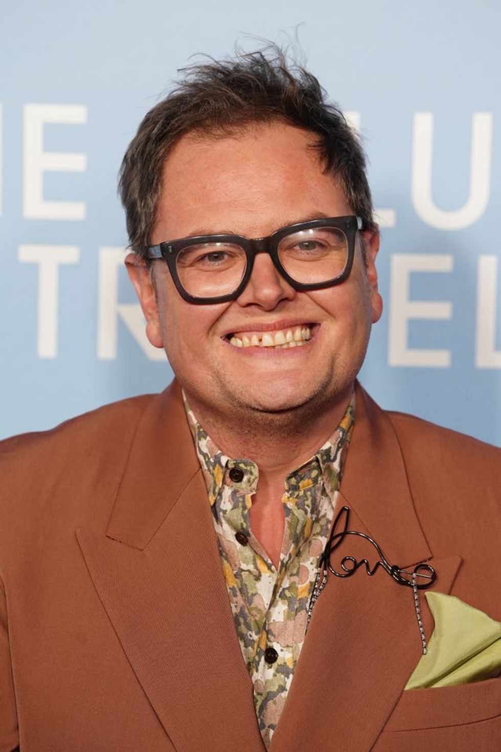 Alan Carr smiling