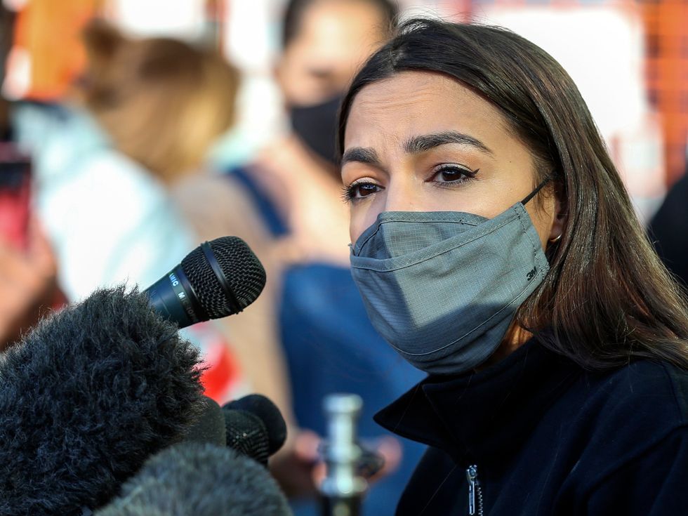 Alexandria Ocasio-Cortez speaks to the media at the Houston Food Bank