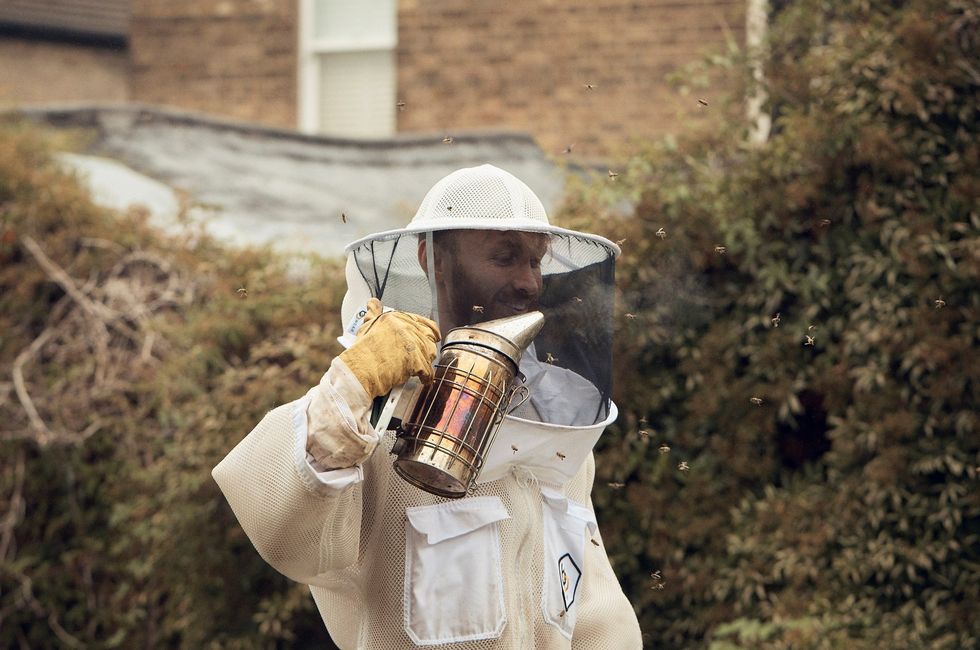Ali Alzein quit his job in the fashion industry when he realised the beneficial impact beekeeping had on his mental health (Olly Burn/PA)